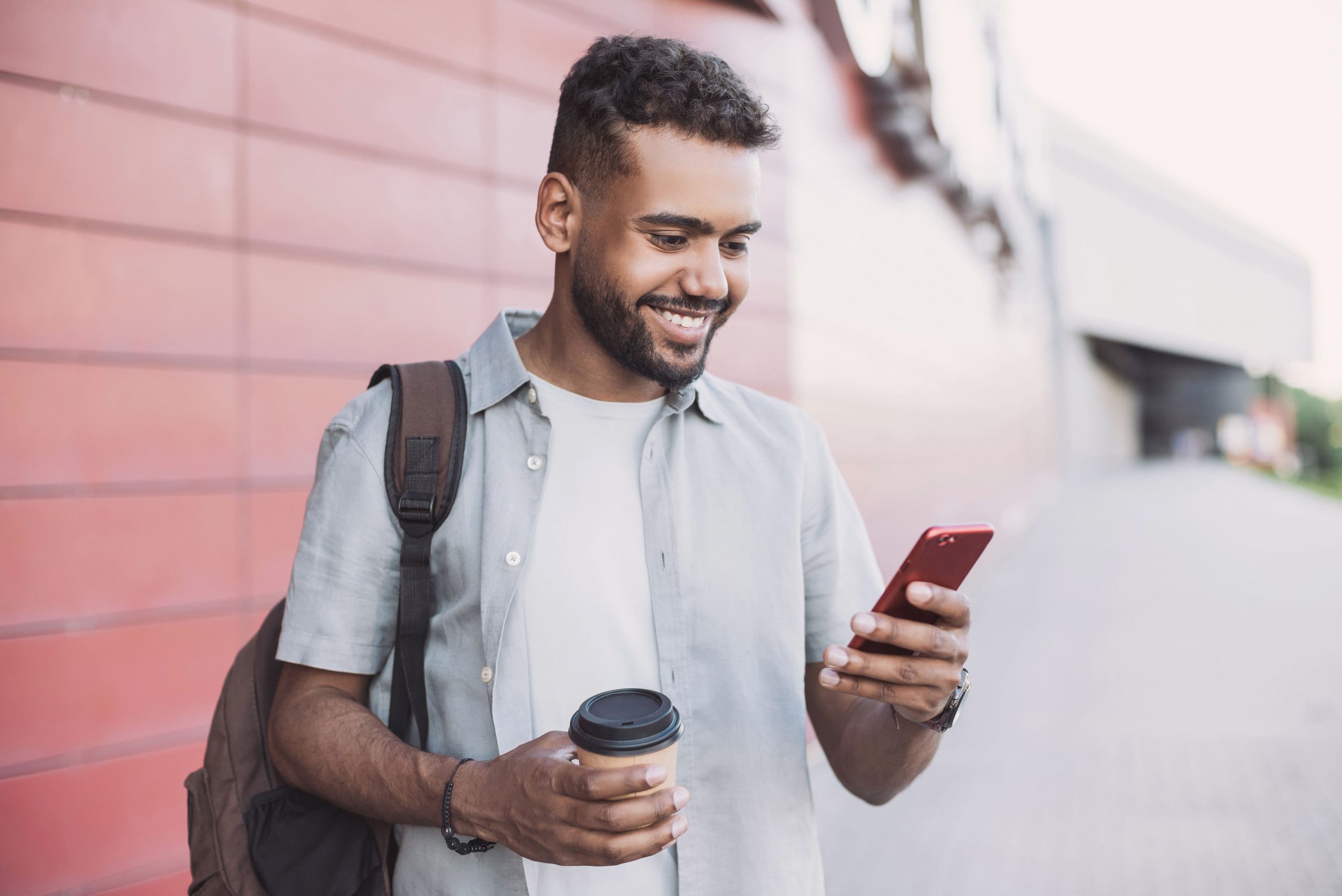 a young man using his phone