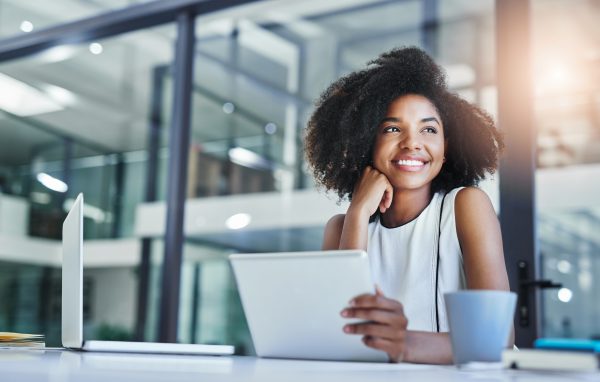 Cropped shot of an attractive young businesswoman working in her office